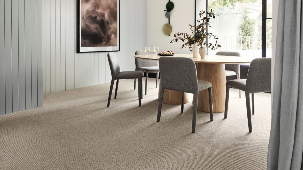 Carpet in dining room with open window