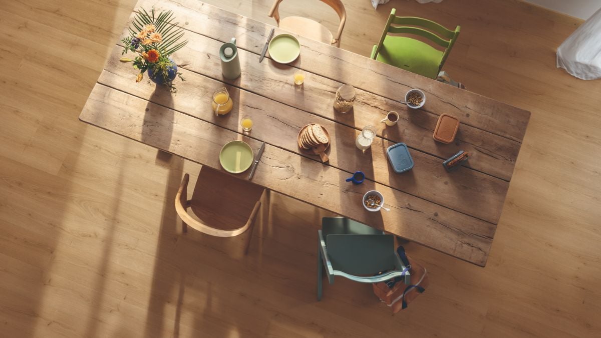 Dining room with light timber hybrid flooring