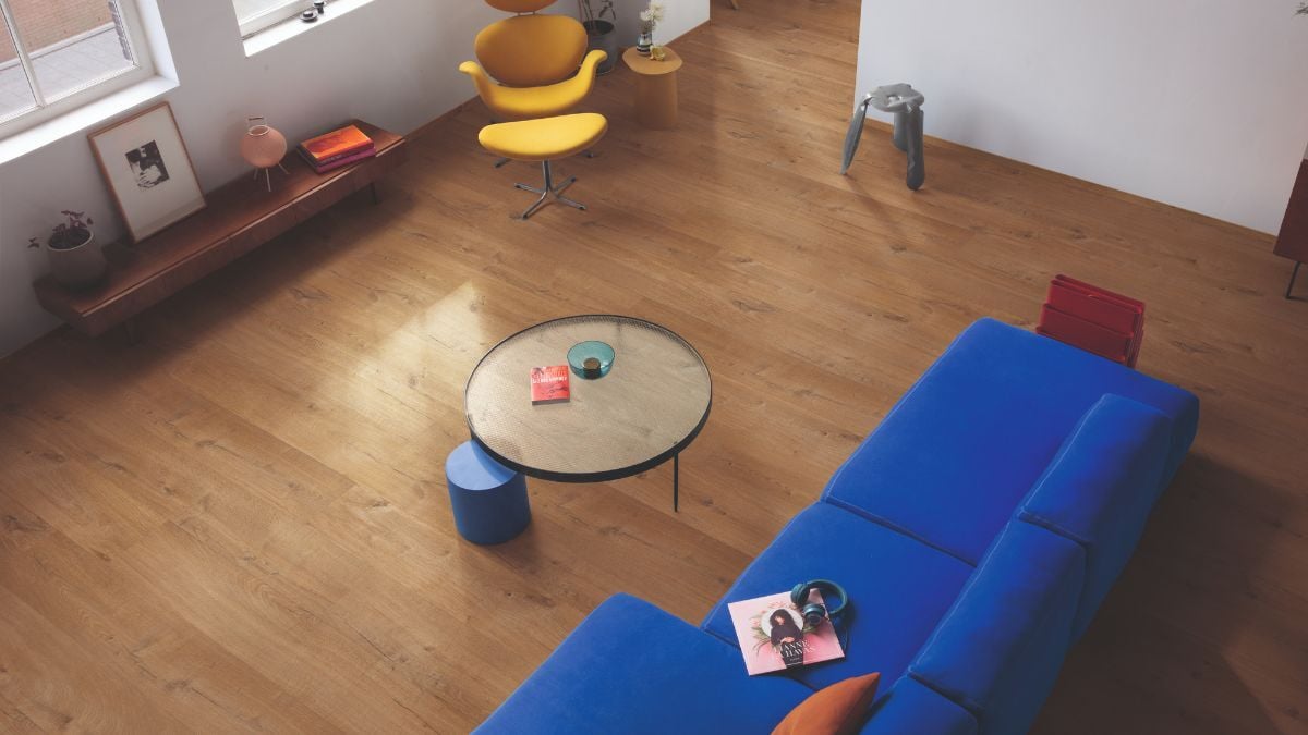 Hybrid Flooring in Living Room with Blue Sofa