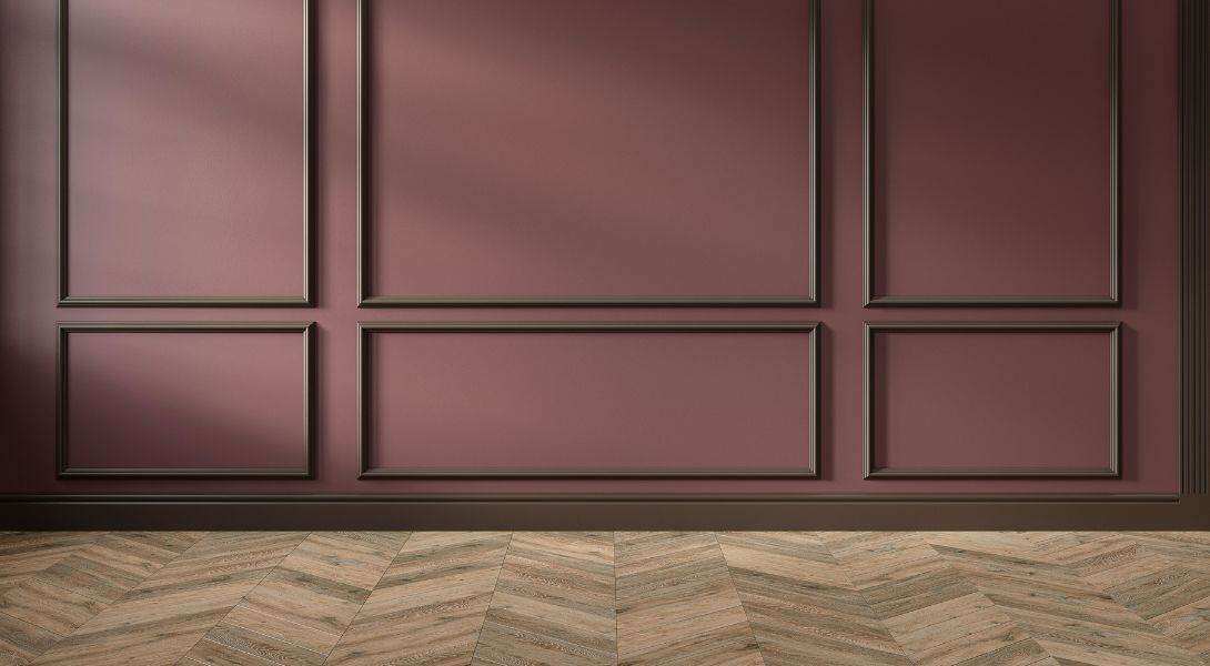 Modern classic red, marsala, burgundy color empty interior with wall panels, mouldings and wooden floor