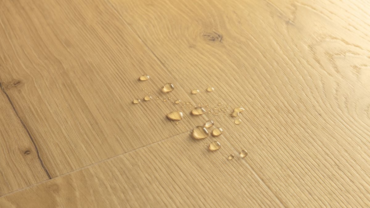 Water on Light Oak Hybrid flooring